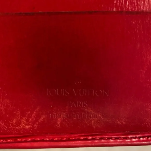 Red leather Louis Vuitton wallet